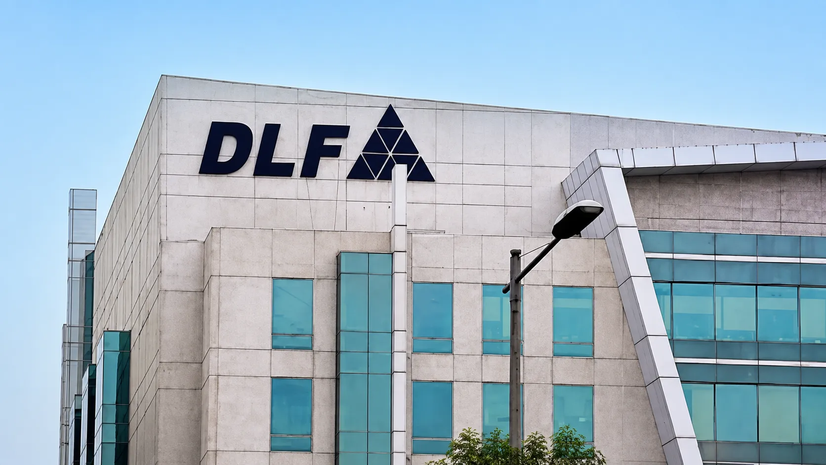 80 Candles and a Quiet Quarter: Why DLF's Modest Q1 Numbers Hide a ₹15,200 Crore Cash Cushion the Company Is Betting Its Next Decade On